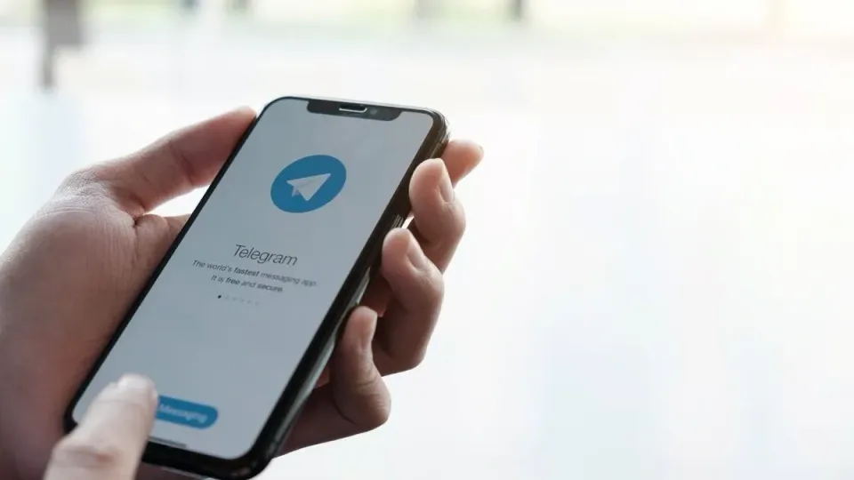 man using telegram to promote crypto ads